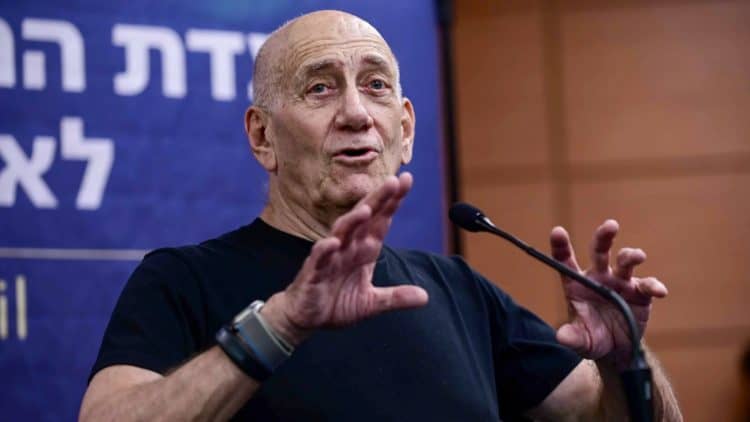 Last week, former Israeli Prime Minister Ehud Olmert, seen here at a March 2023 demonstration in Tel Aviv, wrote an op-ed condemning his country for committing "war crimes".