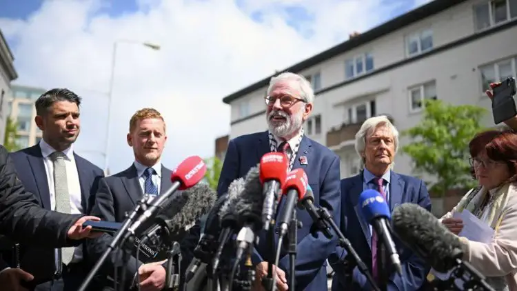 Adams speaks outside court after being awarded €100,000 in damages.